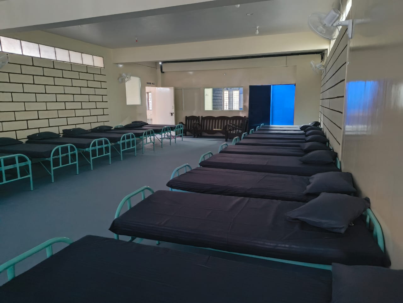 Dormitory with clean beds at Sankalpa Foundation
